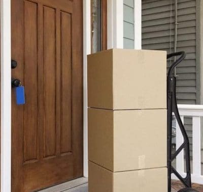 Cardboard-boxes-on-front-porch-of-house